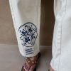 2210-dir-1679091c5a88-6-variation-3.jpg Dolce Vita Embroidered Denim Barrel Leg Jeans