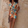 385-shell-mini-wrap-dress-7.jpg Shell Mini Wrap Dress