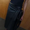 5110-black-vegan-leather-wrap-skirt-4.webp Black Vegan Leather Wrap Skirt